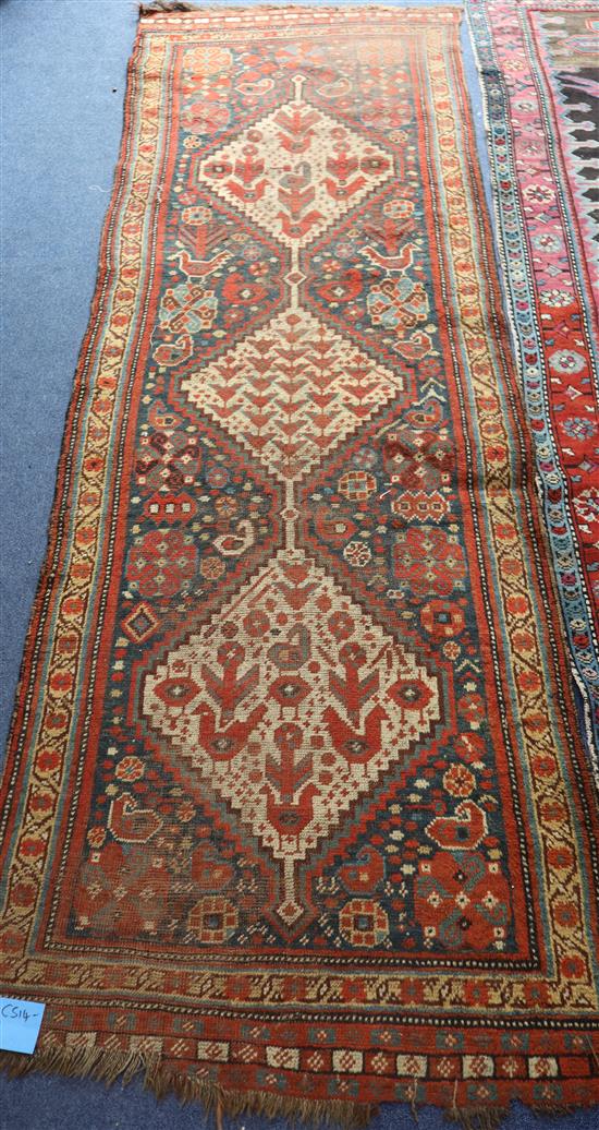 An antique Khamseh blue ground runner, 264 x 67cm